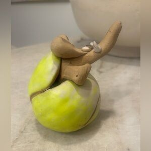 LENORE ATWOOD signed Ceramic elephant in a tennis ball